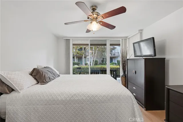 a view of a glass door and a yard
