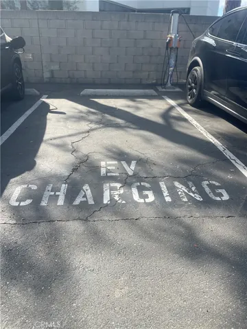 a vase of flowers sitting on a floor