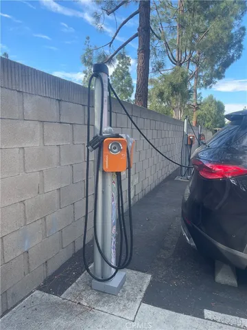 a view of a backyard with swimming pool