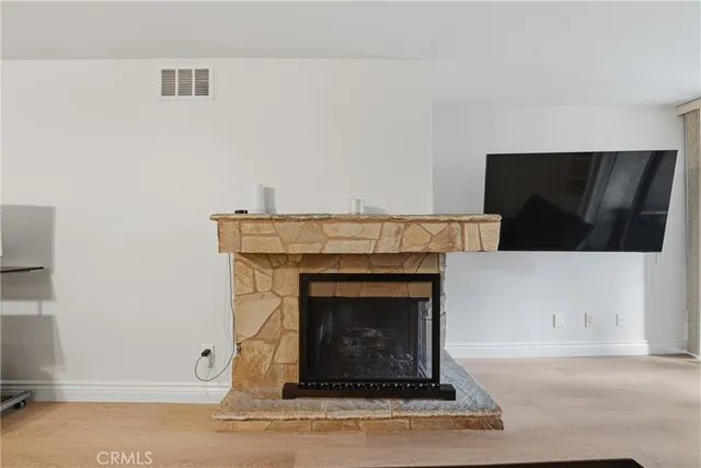a living room with furniture or fireplace and a flat screen tv