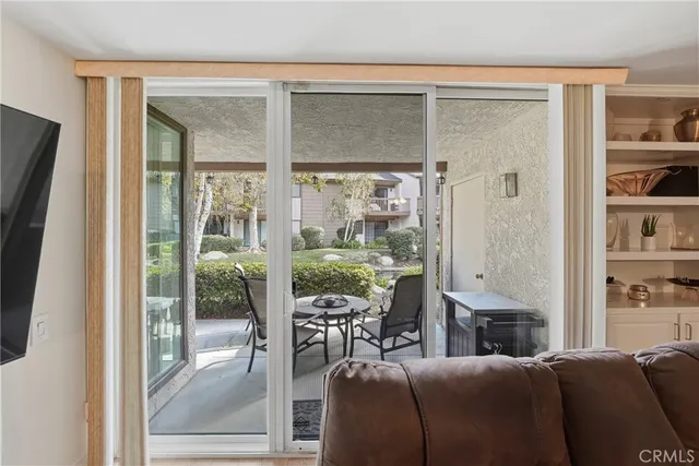 a view of kitchen with cabinets