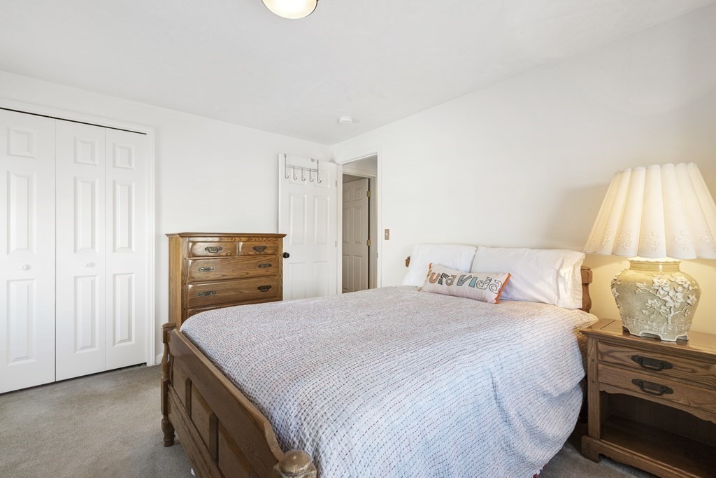 50 Sophia Drive Worcester, MA 01607 - Photo 19 of 37 a bedroom with a bed and a dresser