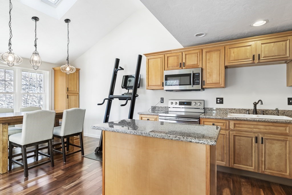 50 Sophia Drive Worcester, MA 01607 - Photo 5 of 37 a kitchen with appliances a sink and cabinets