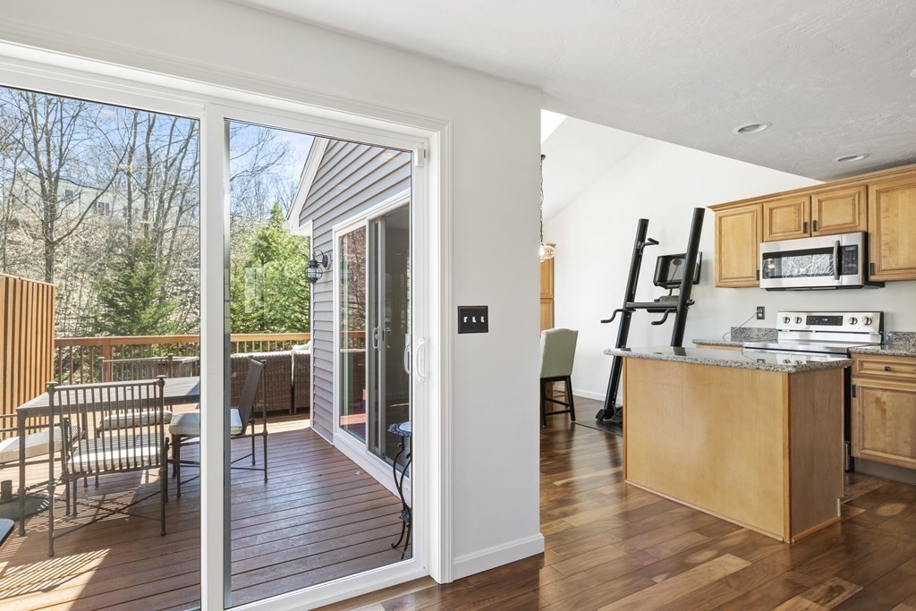 50 Sophia Drive Worcester, MA 01607 - Photo 7 of 37 a view of kitchen with furniture and wooden floor