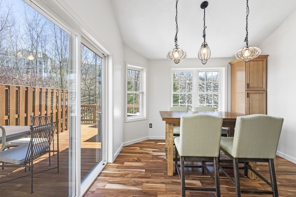 50 Sophia Drive Worcester, MA 01607 - Photo 8 of 37 a view of a dining room with furniture window and wooden floor