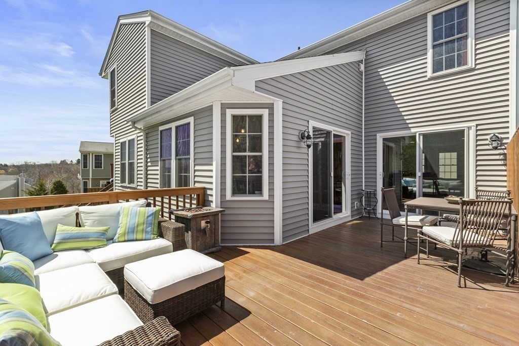 50 Sophia Drive Worcester, MA 01607 - Photo 10 of 37 a balcony with furniture and wooden floor