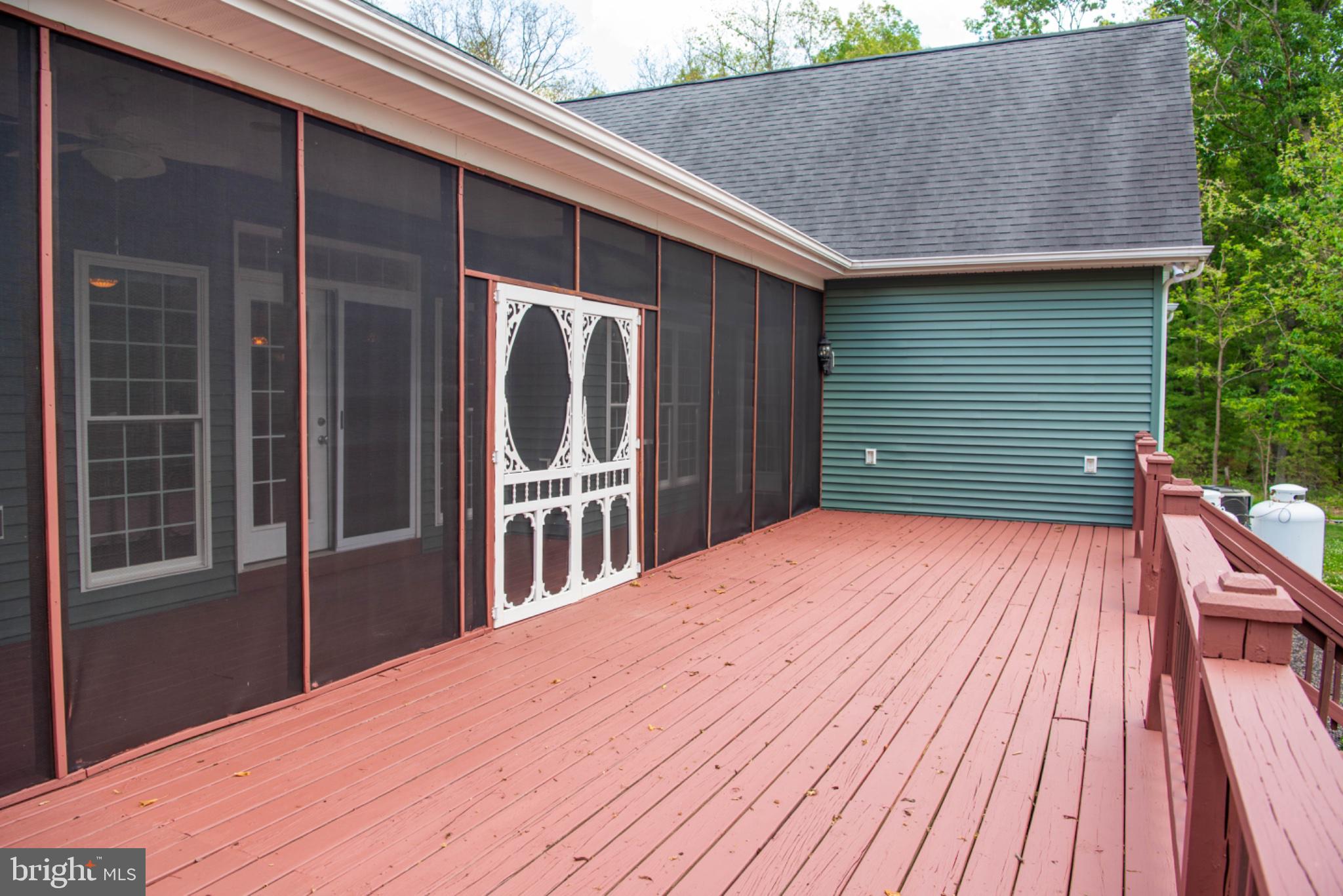 792 Forest Glen Road Moorefield, WV 26836 - Photo 127 of 146 Charming screened porch for serene moments.