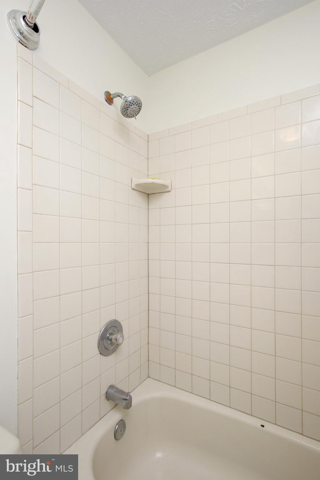 17107 Spates Hill Road Poolesville, MD 20837 - Photo 34 of 50 Full Bath 2 on upper level - Tile surround shower