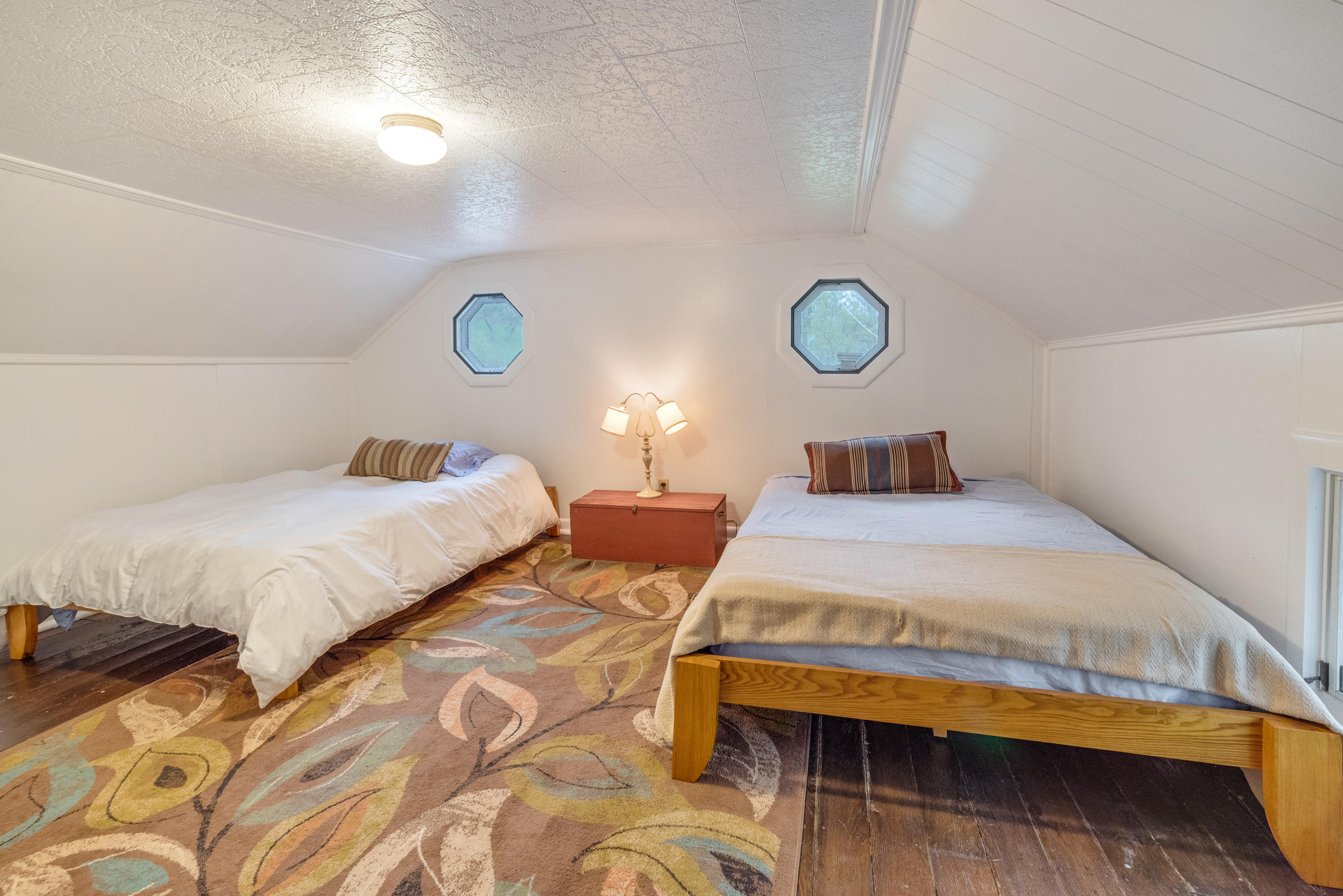757 Halls Store Road Southwest Willis, VA 24380 - Photo 23 of 43 a bedroom with a bed and a window