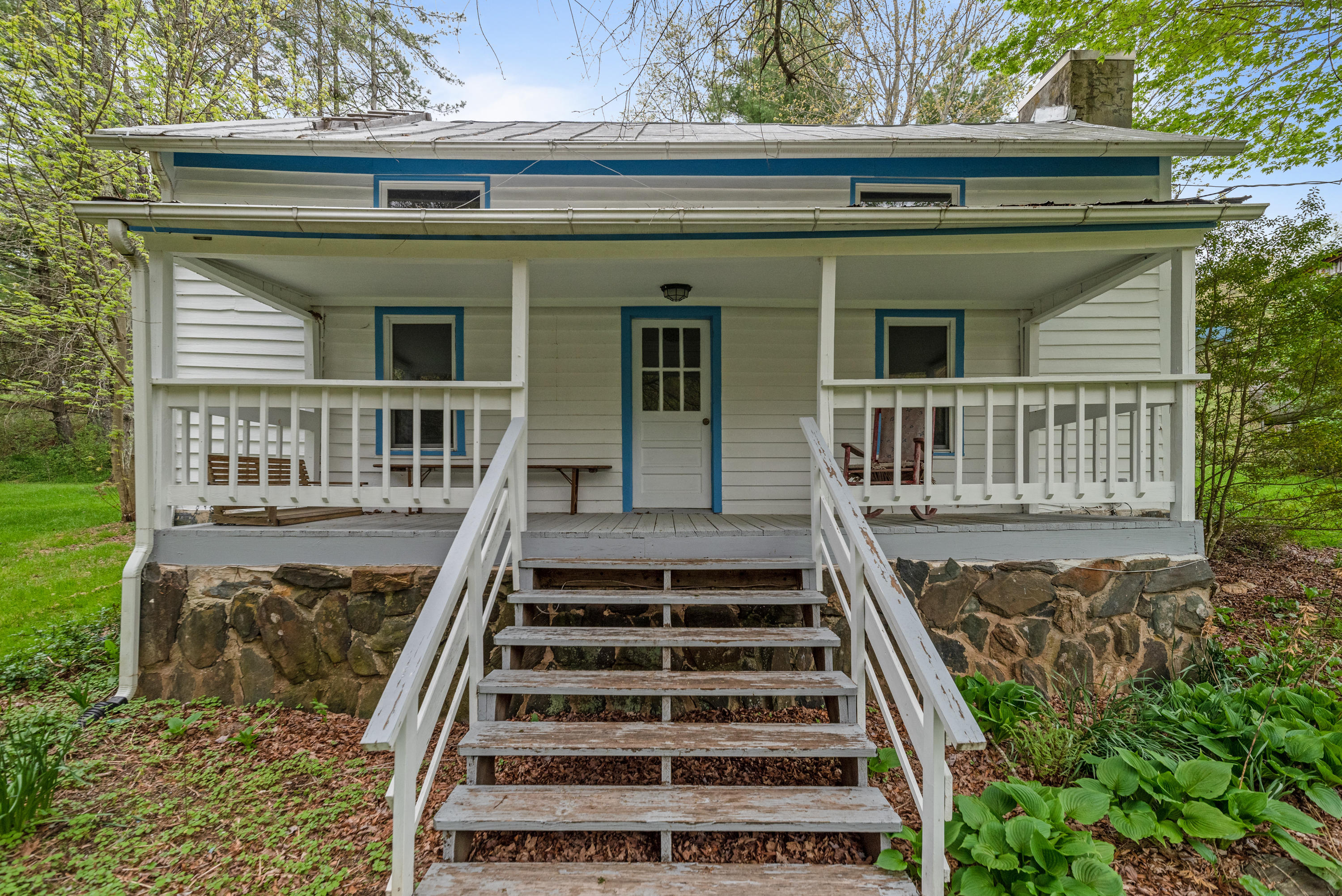 757 Halls Store Road Southwest Willis, VA 24380 - Photo 27 of 43 front view of a house with a deck