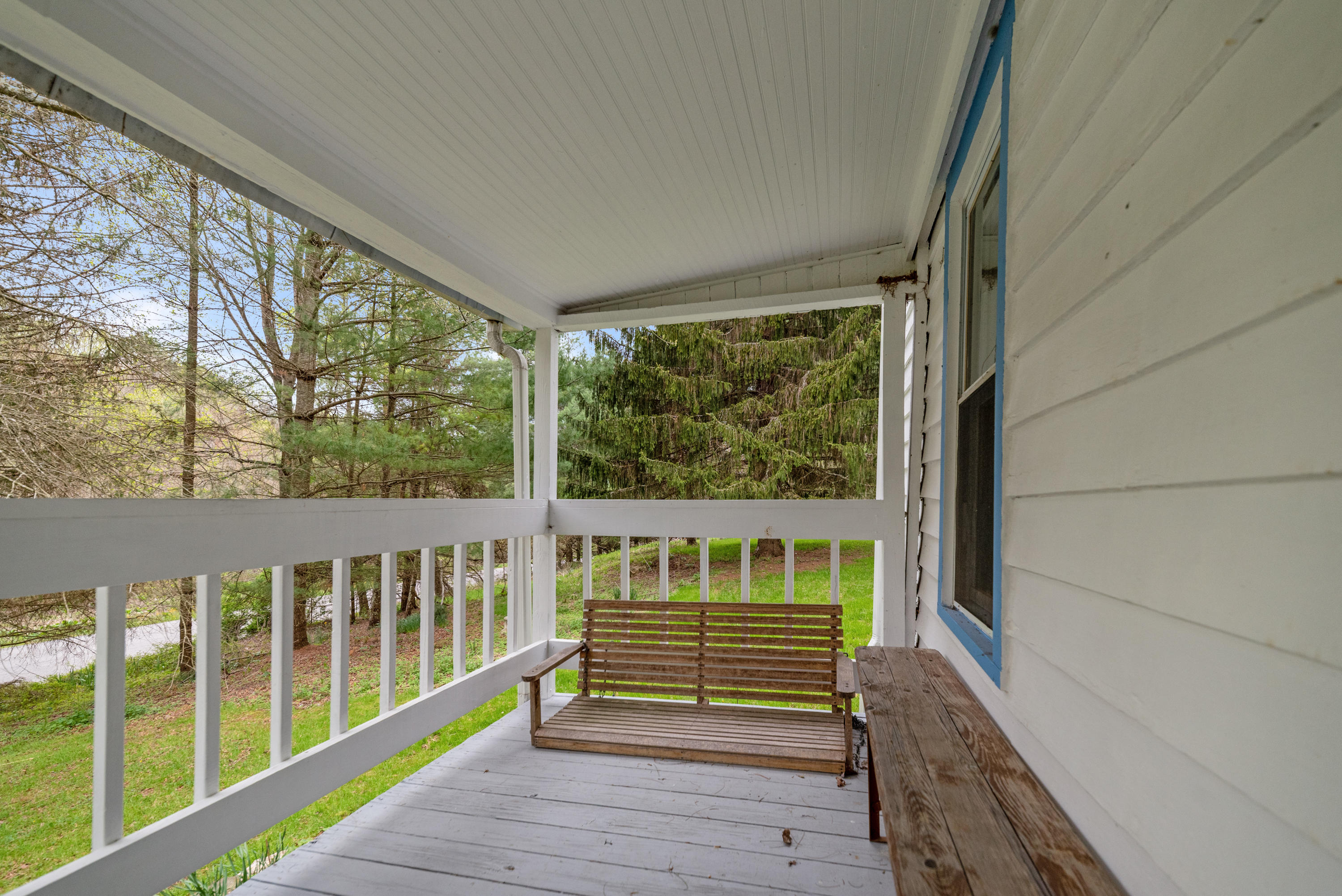 757 Halls Store Road Southwest Willis, VA 24380 - Photo 28 of 43 a view of two chairs in a balcony