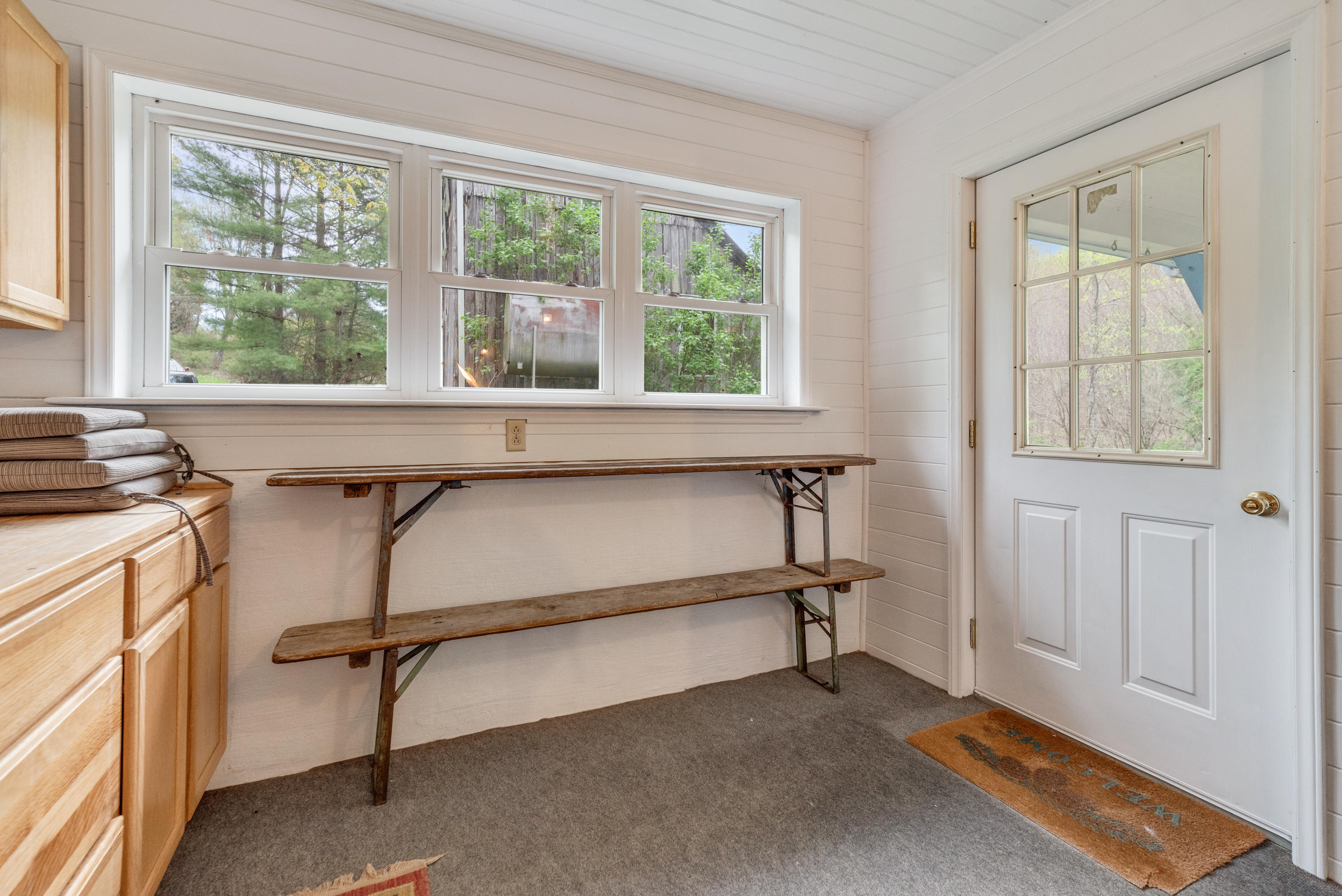 757 Halls Store Road Southwest Willis, VA 24380 - Photo 6 of 43 a view of a livingroom with furniture and windows