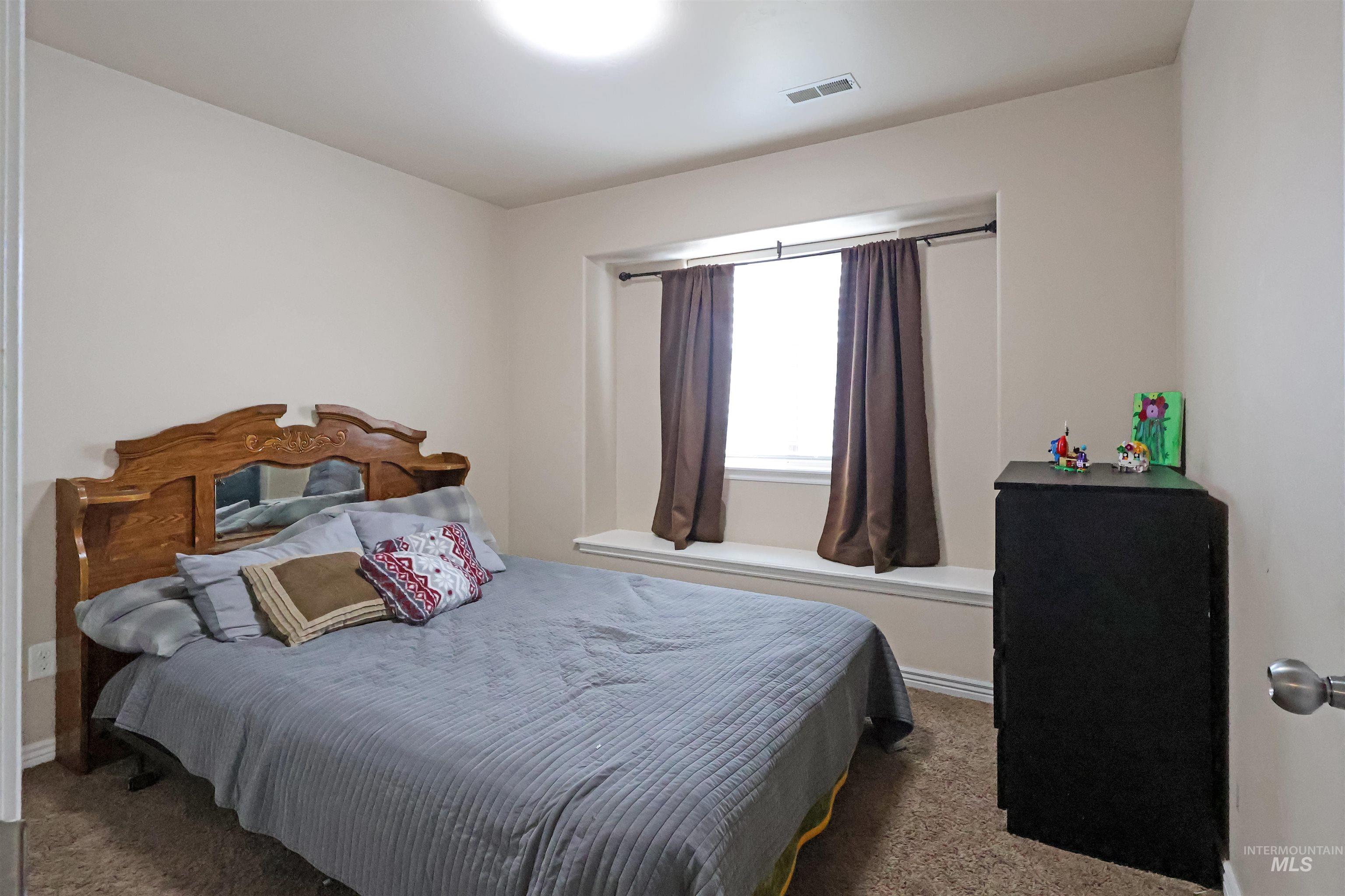 717 South B Street Rupert, ID 83350 - Photo 9 of 13 View of carpeted bedroom