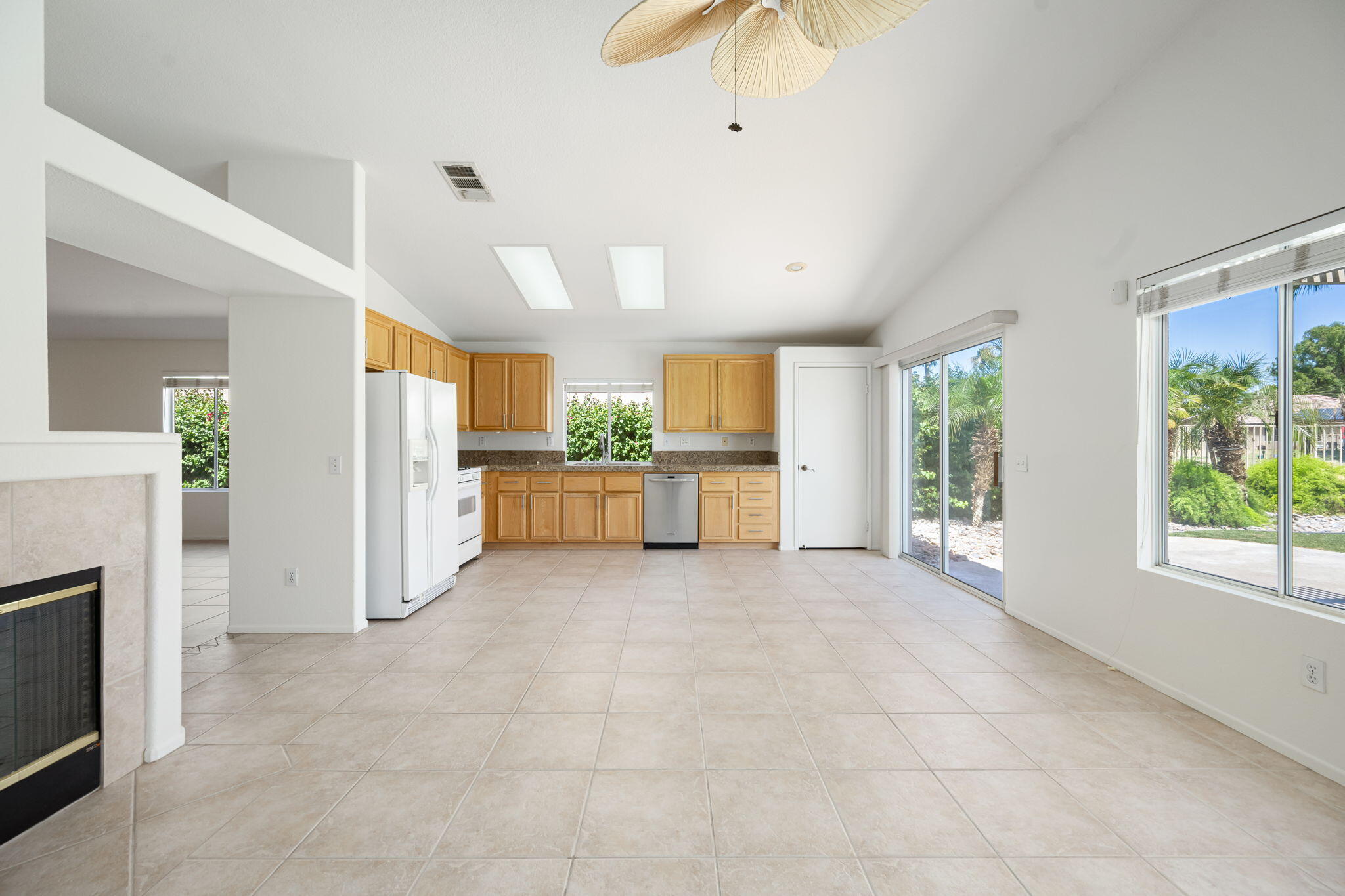 82560 Delano Drive Indio, CA 92201 - Photo 12 of 51 a view of a kitchen with a sink and a fireplace