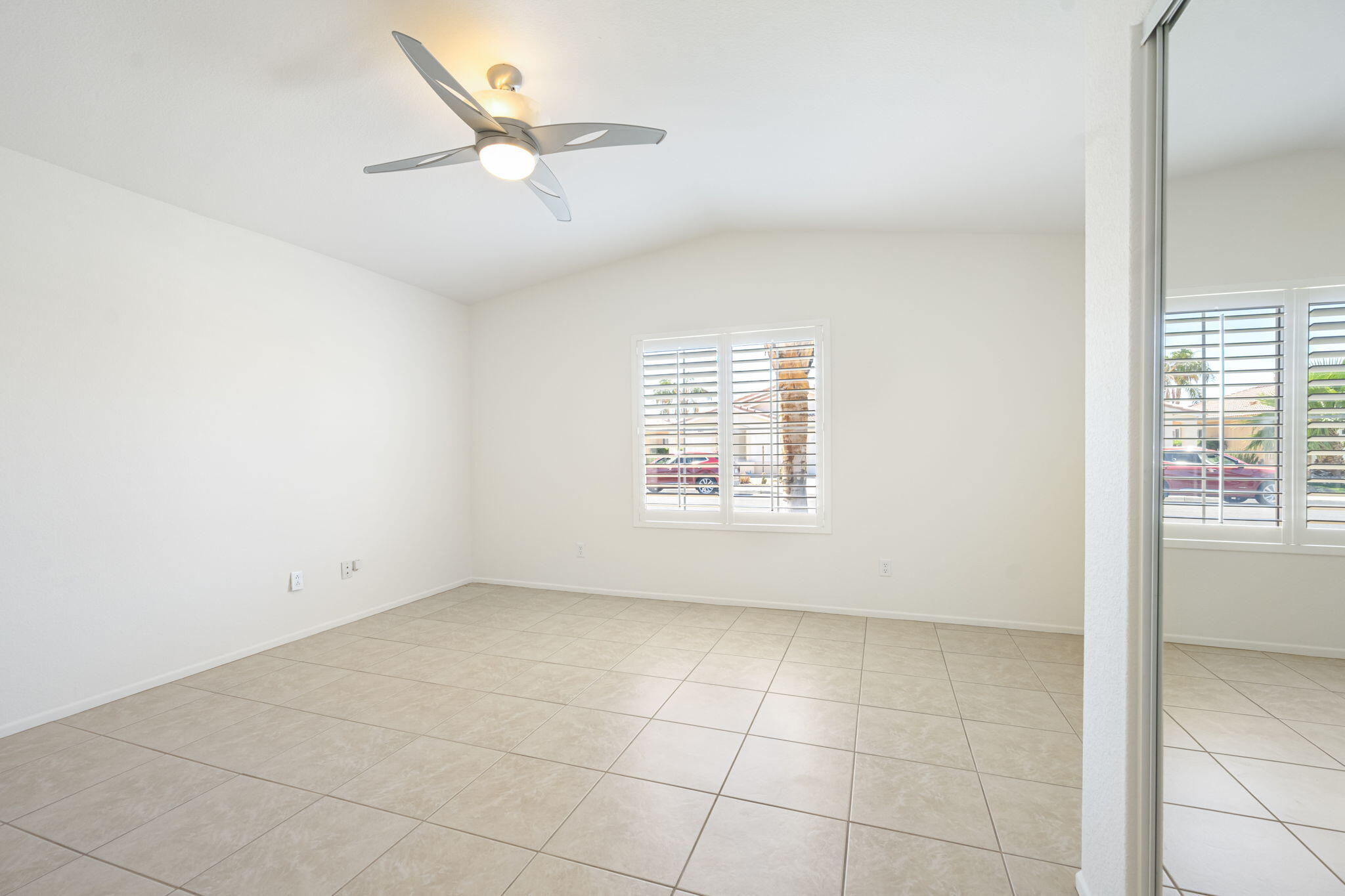 82560 Delano Drive Indio, CA 92201 - Photo 22 of 51 a view of an empty room with a window