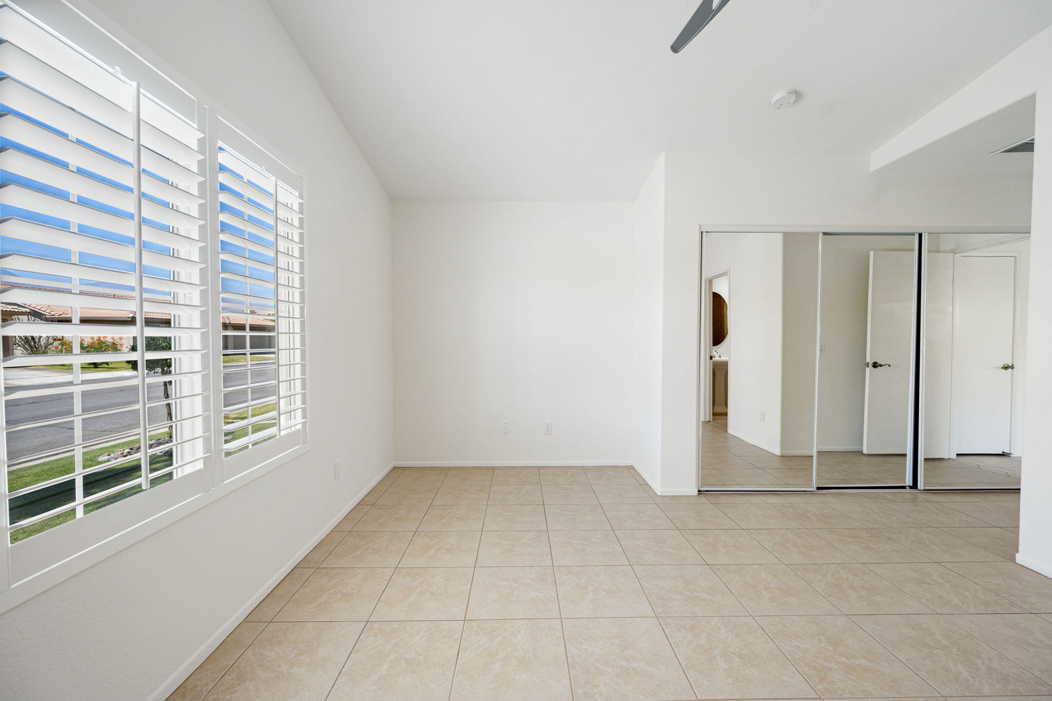 82560 Delano Drive Indio, CA 92201 - Photo 23 of 51 a view of an empty room with a window