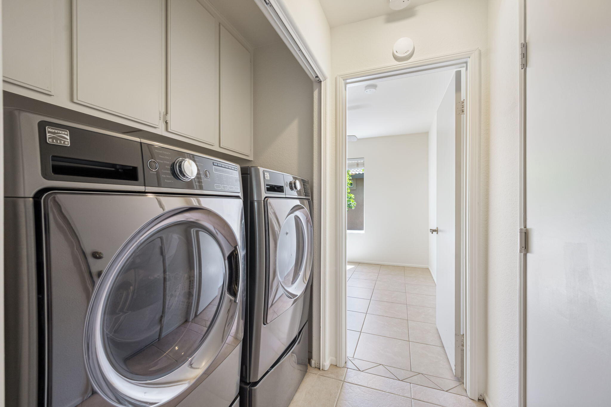 82560 Delano Drive Indio, CA 92201 - Photo 25 of 51 a utility room with dryer and washer