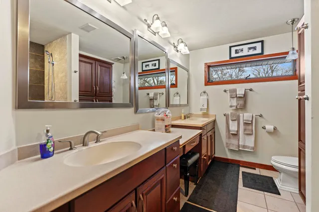 a livingroom with furniture and a flat screen tv
