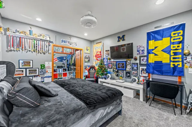 a bedroom with furniture and a bed