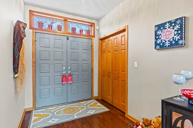 a kitchen with stainless steel appliances granite countertop a refrigerator and a stove