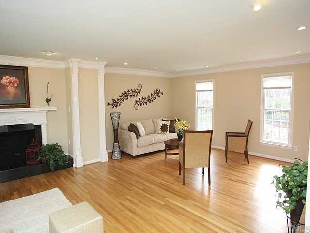 6808 Garrison Court Raleigh, NC 27613 - Photo 3 of 20 Neutral decor and gleaming hardwood floors accentuate this huge 24x18 room. Den/Family/Great Room