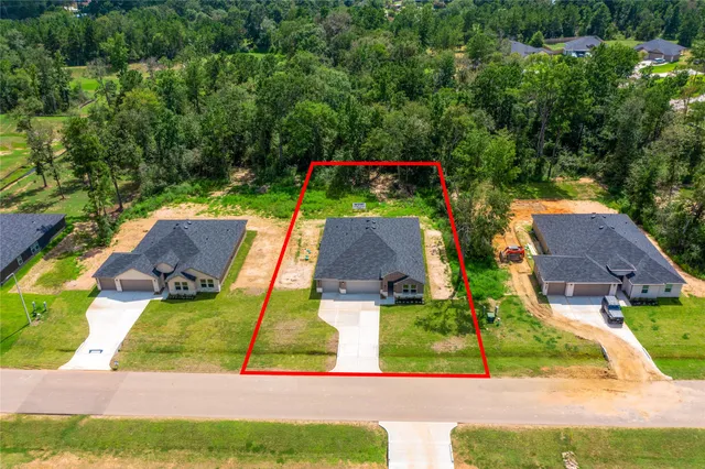 a picture of a bathroom with a shower