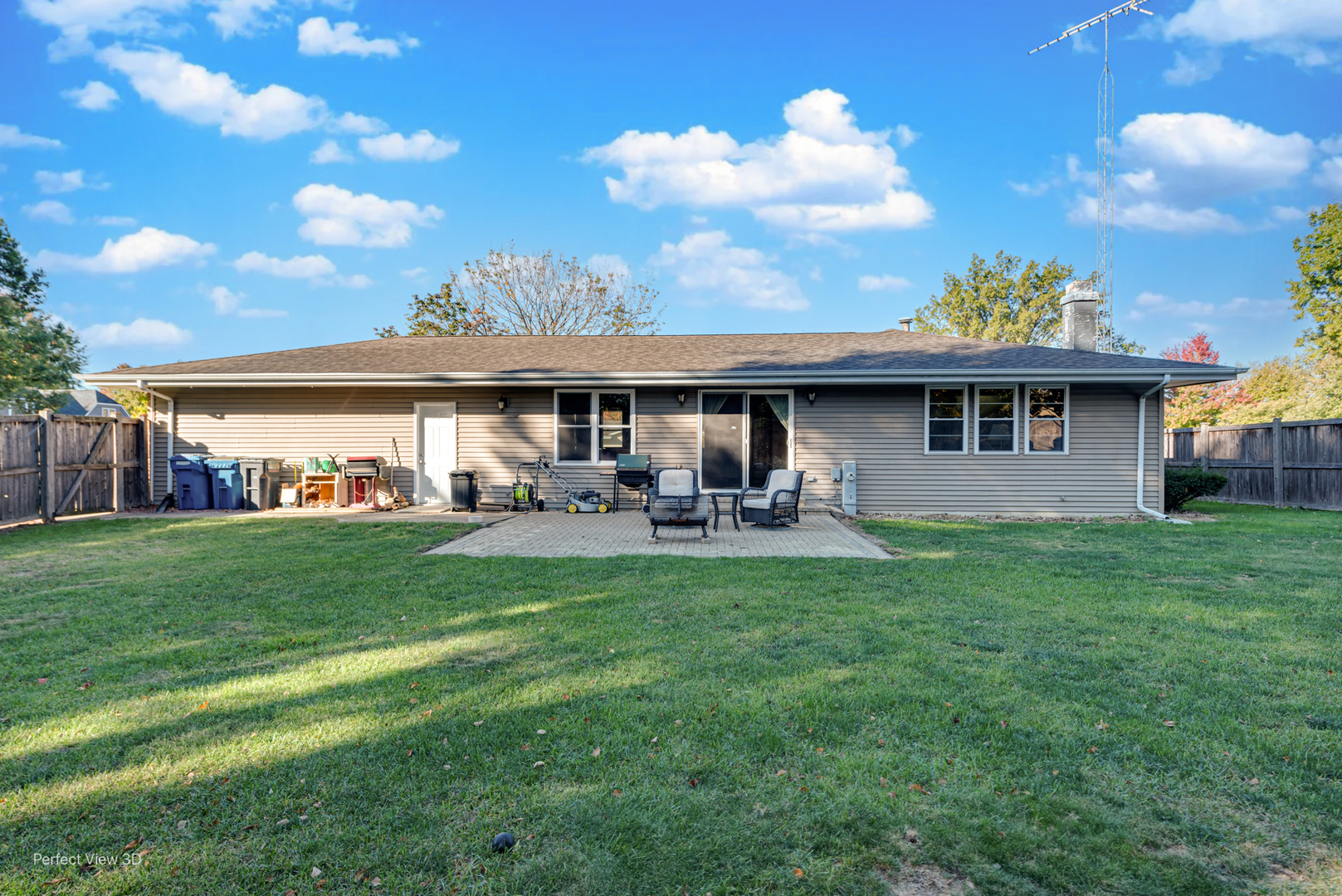 800 Charles Street Morris, IL 60450 - Photo 3 of 24 a view of a house with a backyard porch and sitting area