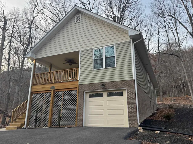 a view of a house with a garage