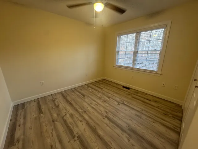 a view of a room with racks on the wall