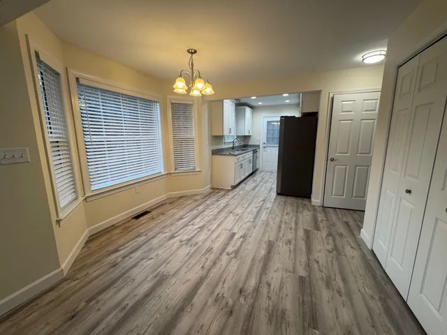 a kitchen with sink and window