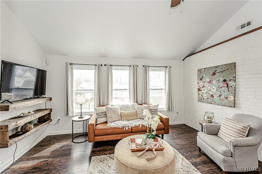 3711 Yard Arm Drive Chester, VA 23831 - Photo 12 of 50 a living room with furniture and a flat screen tv
