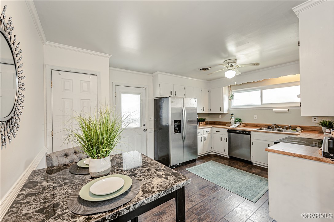 3711 Yard Arm Drive Chester, VA 23831 - Photo 21 of 50 a kitchen with refrigerator and stove