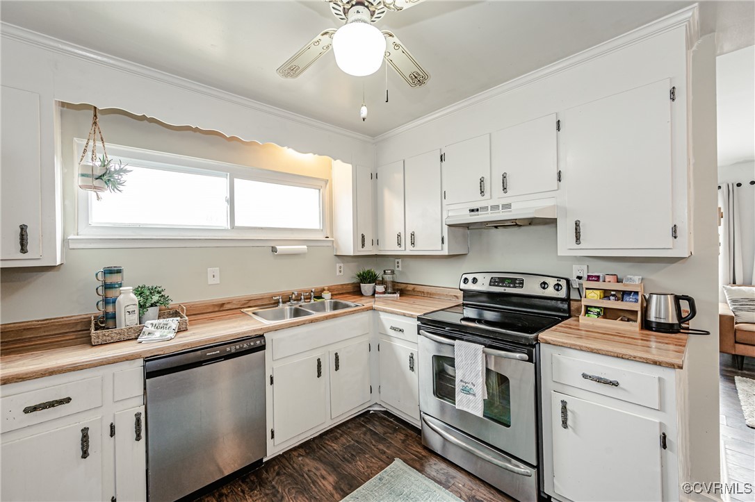 3711 Yard Arm Drive Chester, VA 23831 - Photo 24 of 50 a kitchen with a white cabinets and white appliances