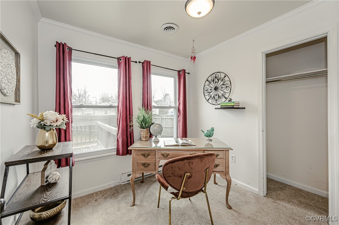 3711 Yard Arm Drive Chester, VA 23831 - Photo 28 of 50 a view of a dining room with furniture window and outside view