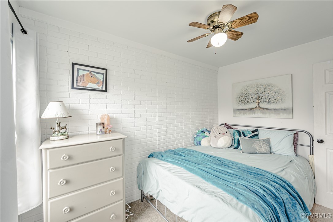 3711 Yard Arm Drive Chester, VA 23831 - Photo 33 of 50 a bedroom with a bed and a lamp on dresser