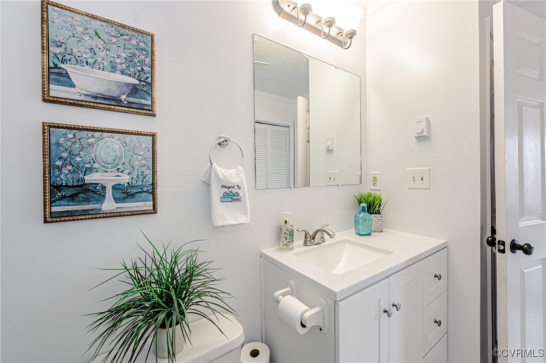 3711 Yard Arm Drive Chester, VA 23831 - Photo 41 of 50 a bathroom with a sink and a mirror