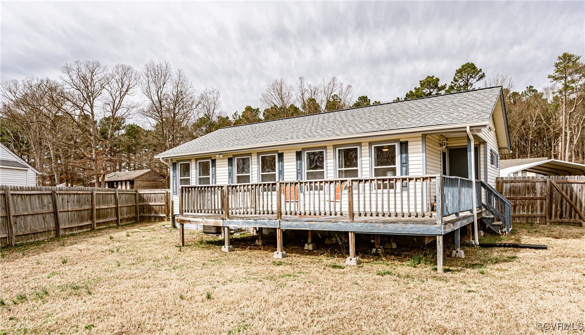 3711 Yard Arm Drive Chester, VA 23831 - Photo 48 of 50 a backyard of a house with table and chairs
