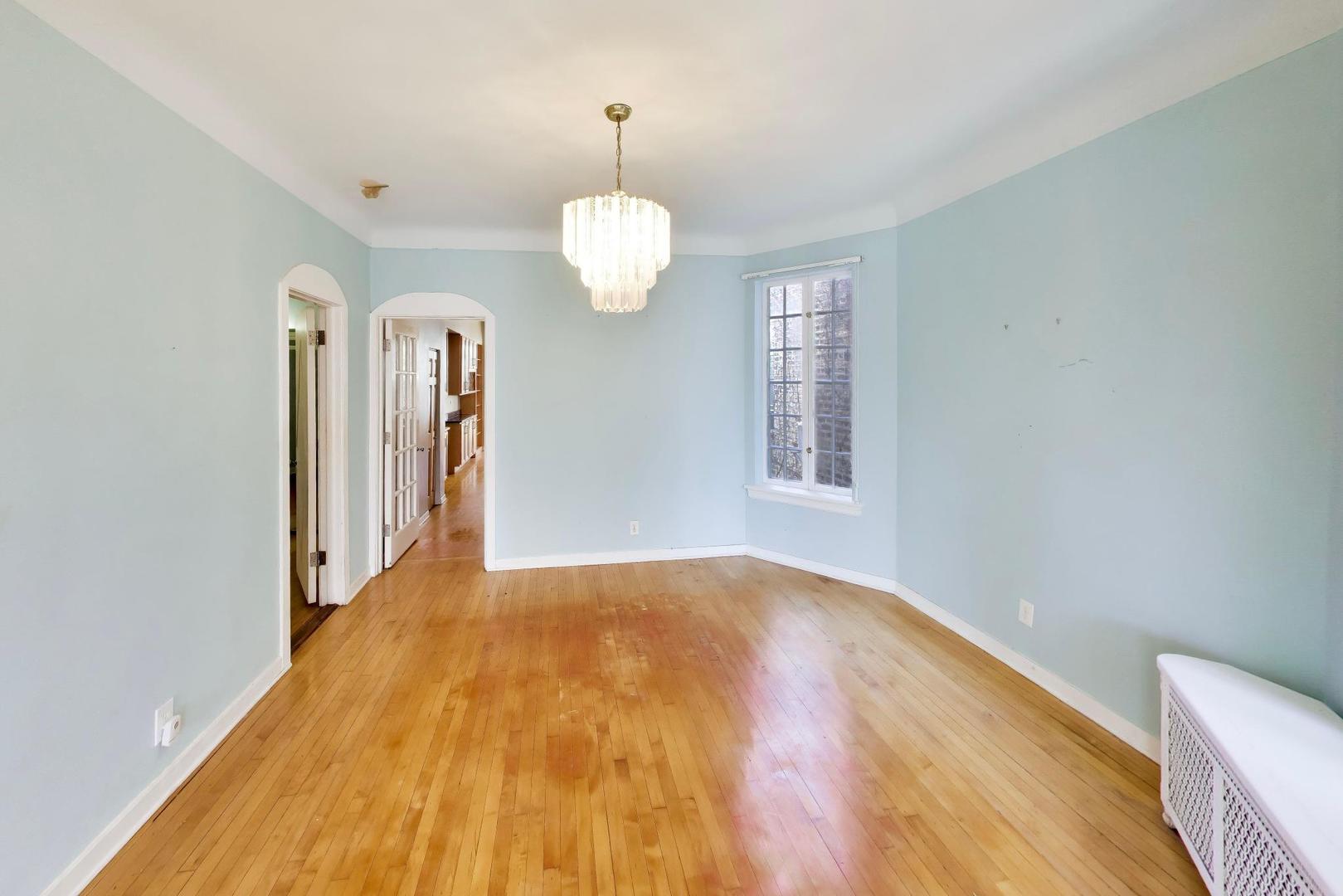 2629 North Troy Street Chicago, IL 60647 - Photo 6 of 16 a view of empty room with wooden floor