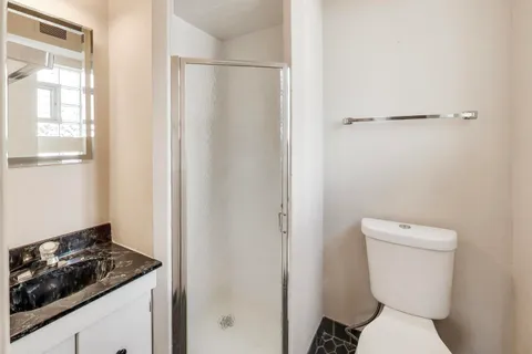a bathroom with a toilet and a sink