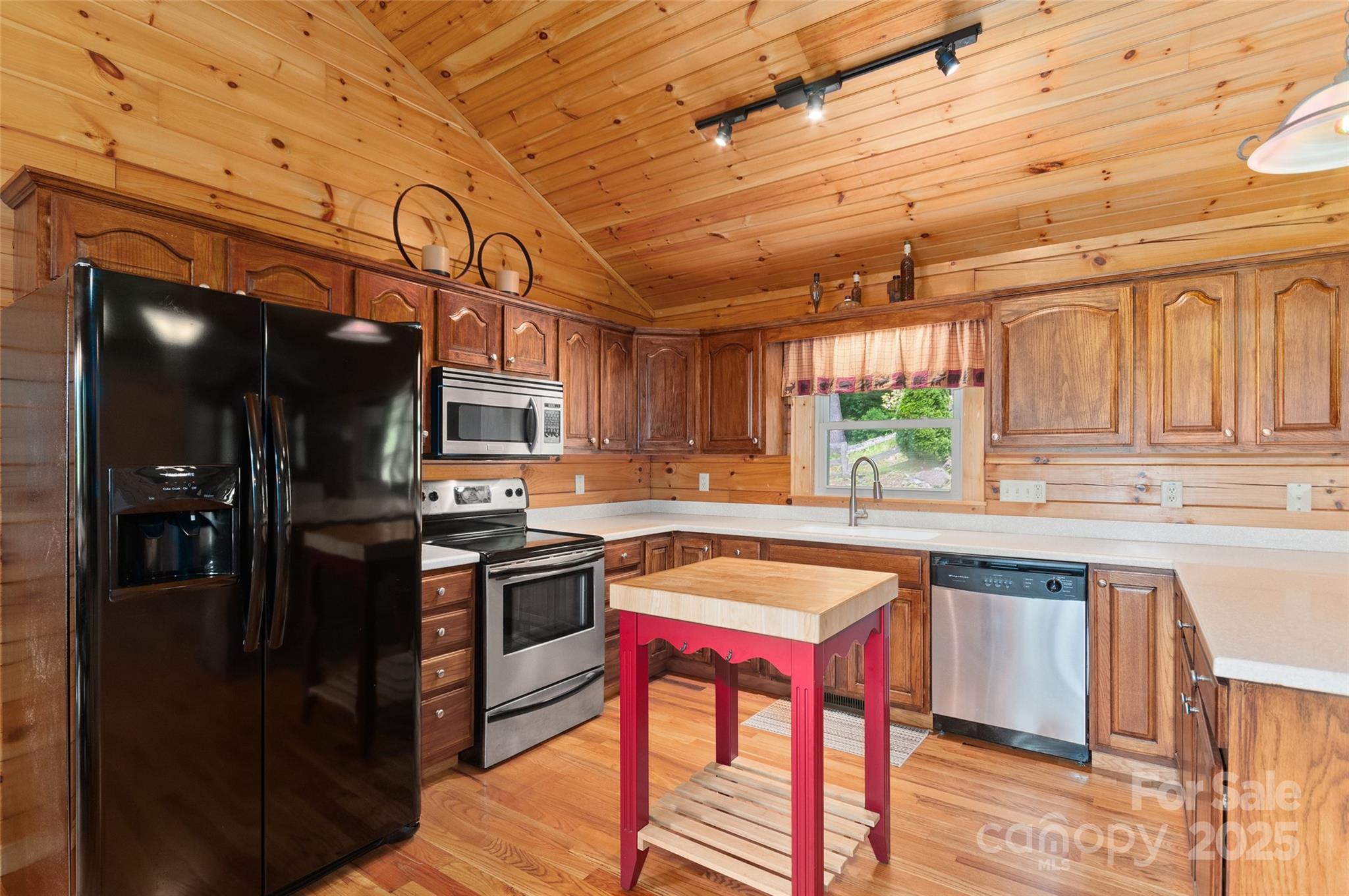 314 Prosperity Ridge Waynesville, NC 28785 - Photo 12 of 48 a kitchen with stainless steel appliances granite countertop a stove a sink and a refrigerator
