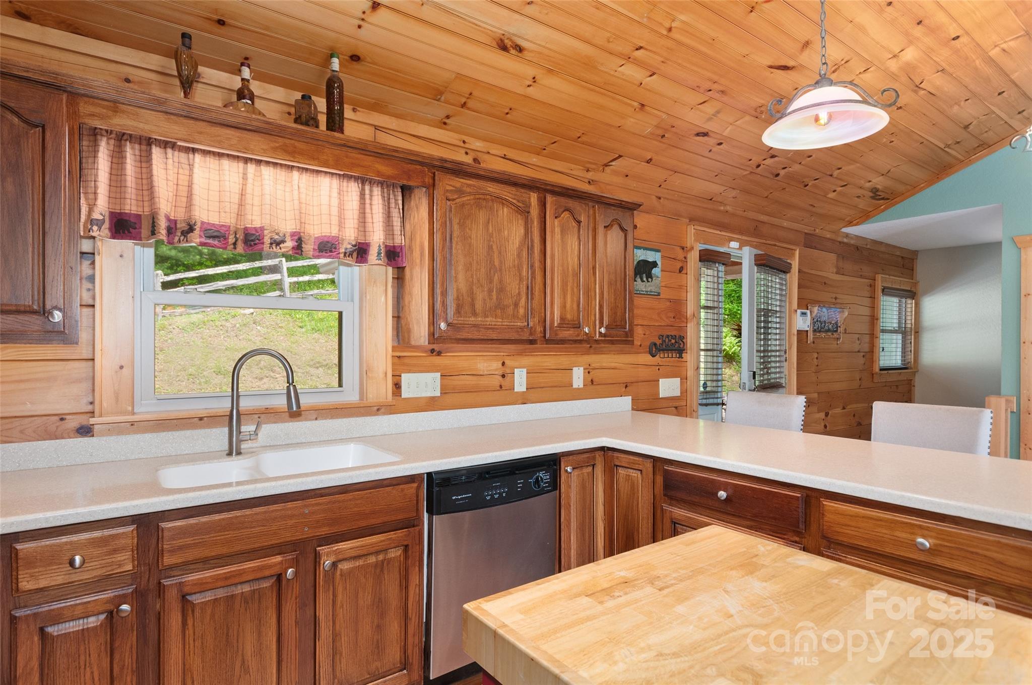 314 Prosperity Ridge Waynesville, NC 28785 - Photo 13 of 48 a kitchen with a sink cabinets and window