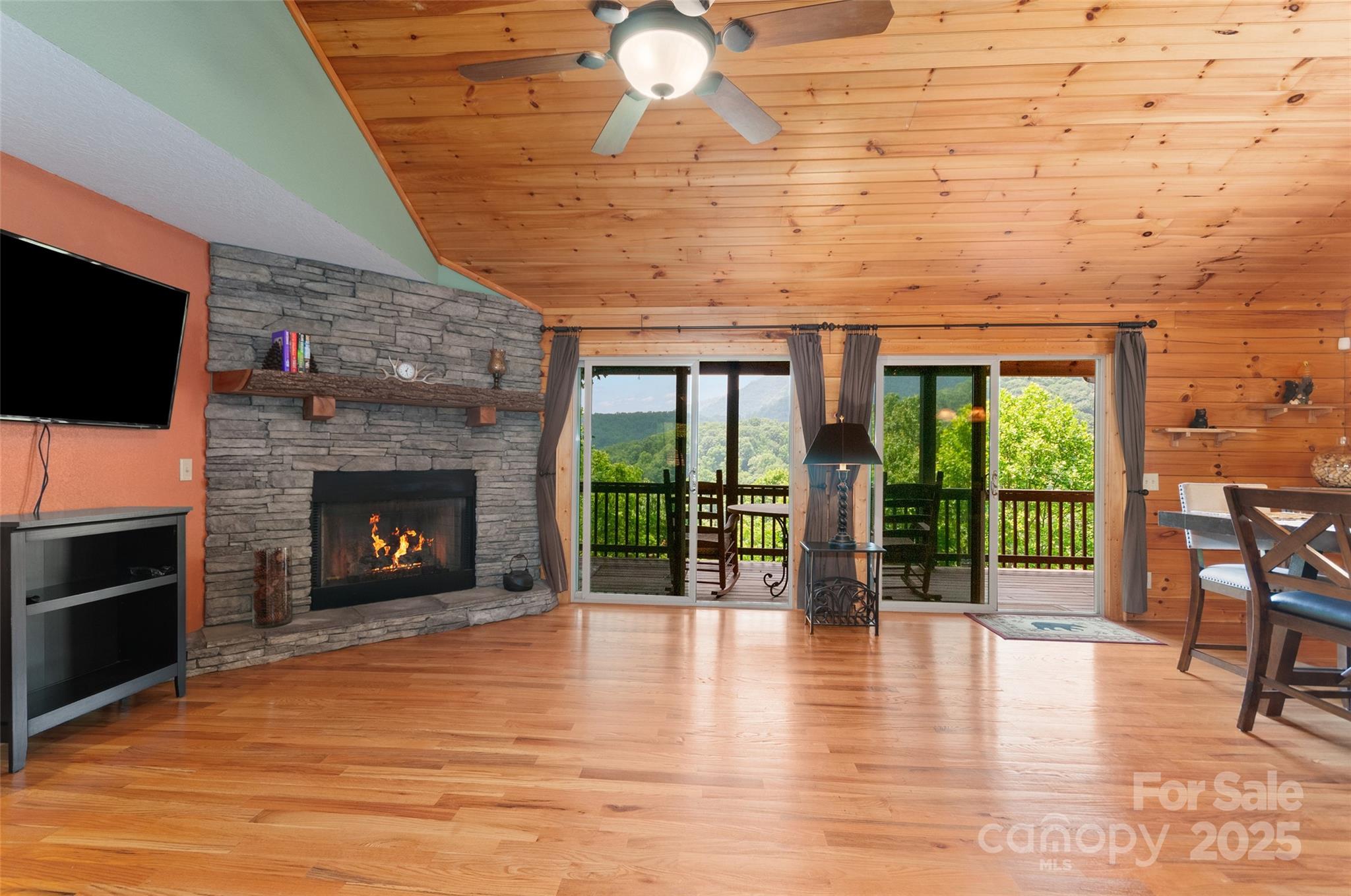314 Prosperity Ridge Waynesville, NC 28785 - Photo 15 of 48 a view of livingroom with furniture a fireplace and wooden floor