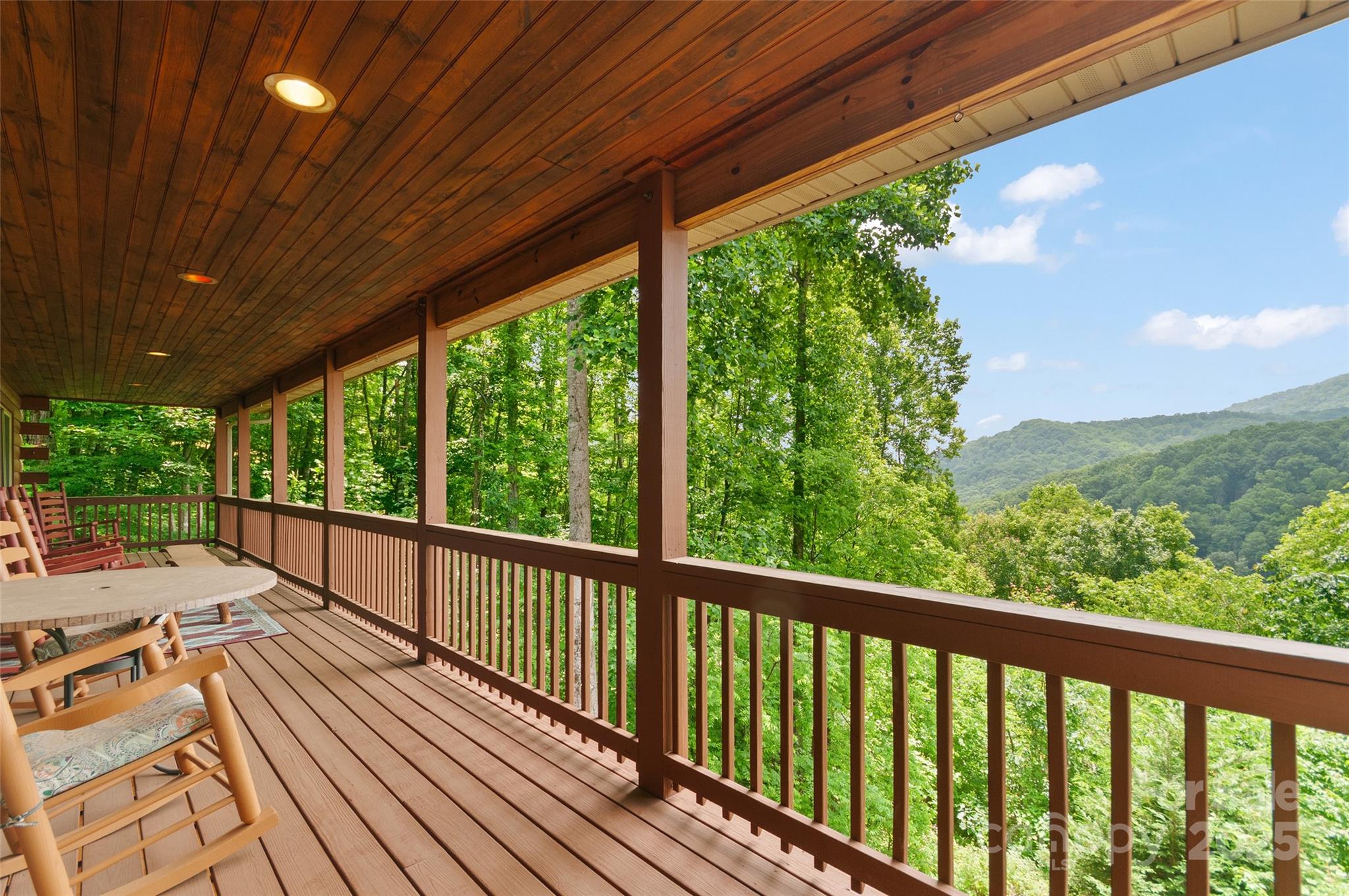 314 Prosperity Ridge Waynesville, NC 28785 - Photo 22 of 48 a view of balcony with wooden floor & fence