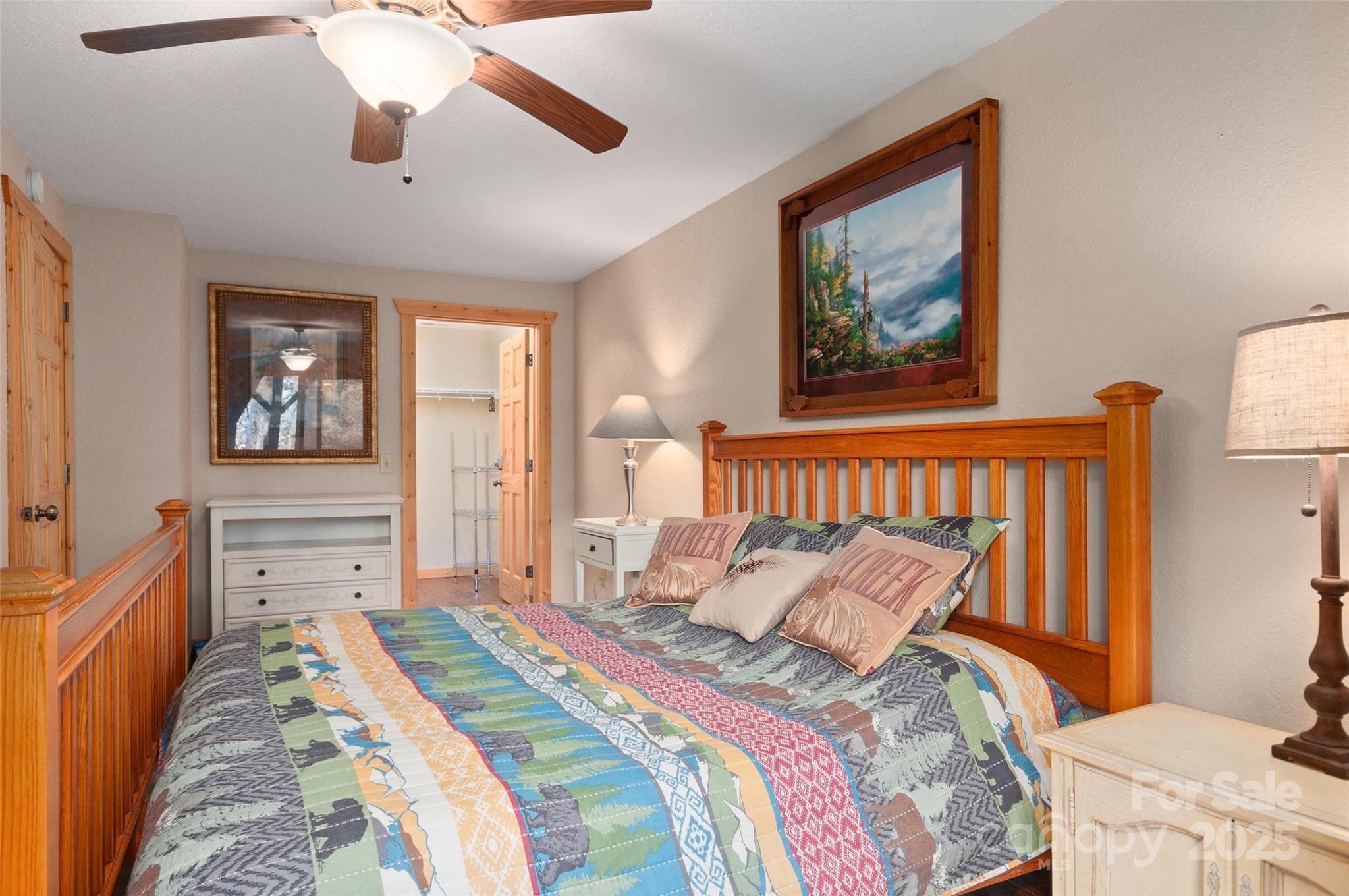 314 Prosperity Ridge Waynesville, NC 28785 - Photo 27 of 48 a bedroom with bed and wooden floor