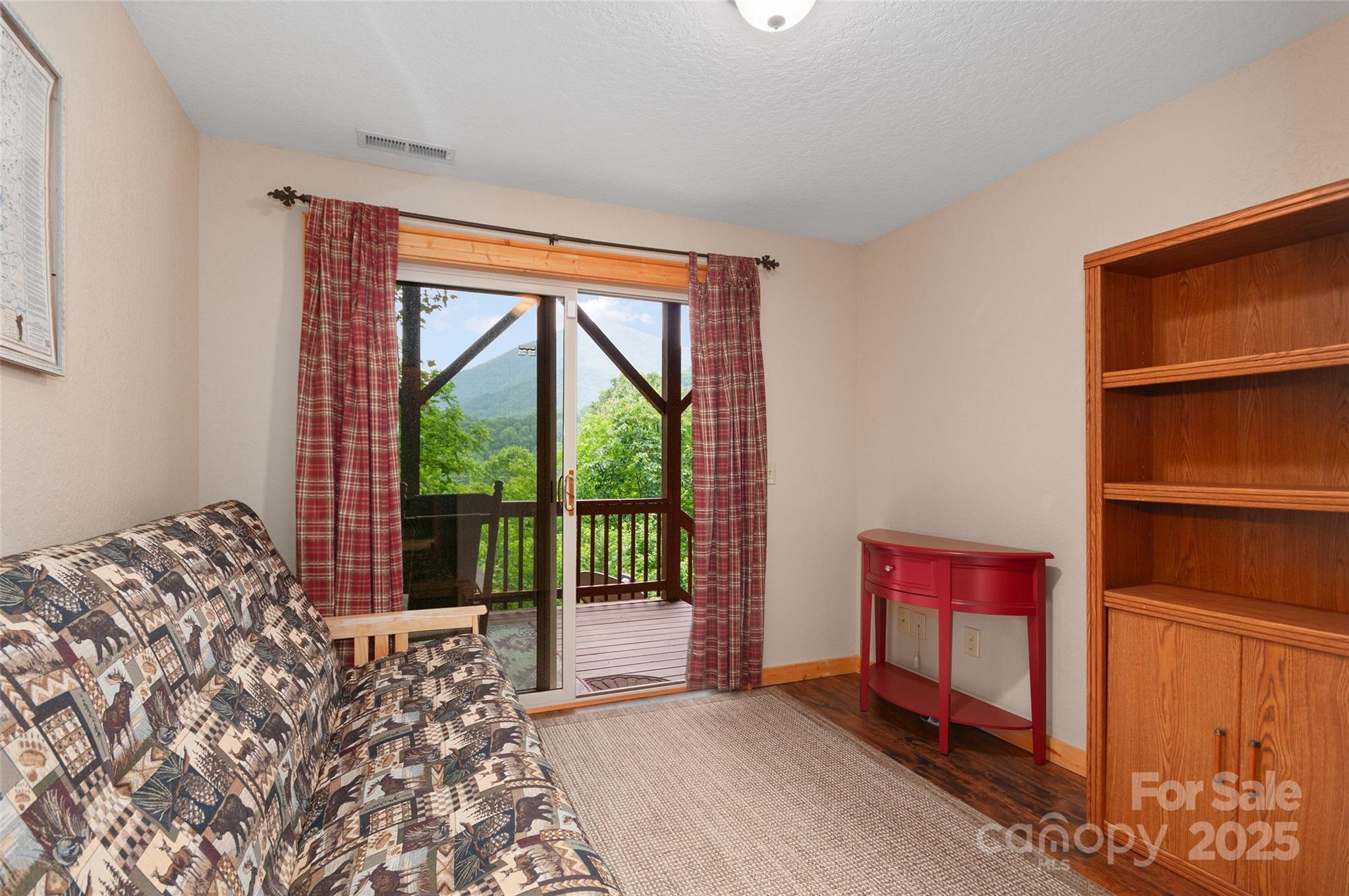 314 Prosperity Ridge Waynesville, NC 28785 - Photo 29 of 48 a bed room with a bed and a window