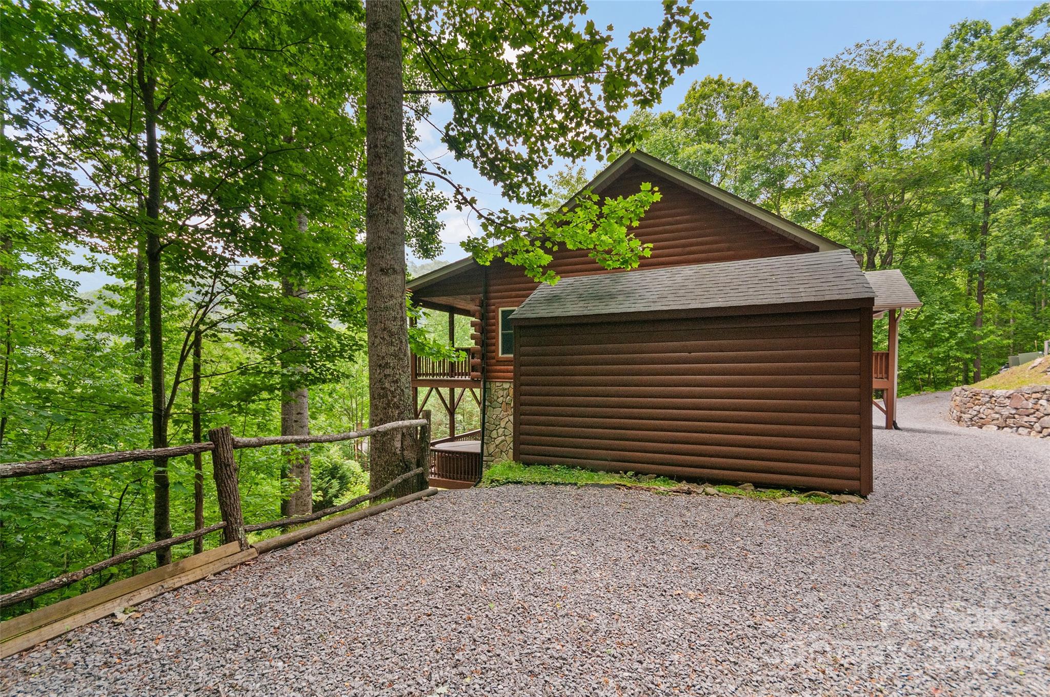 314 Prosperity Ridge Waynesville, NC 28785 - Photo 39 of 48 a small yard with wooden fence