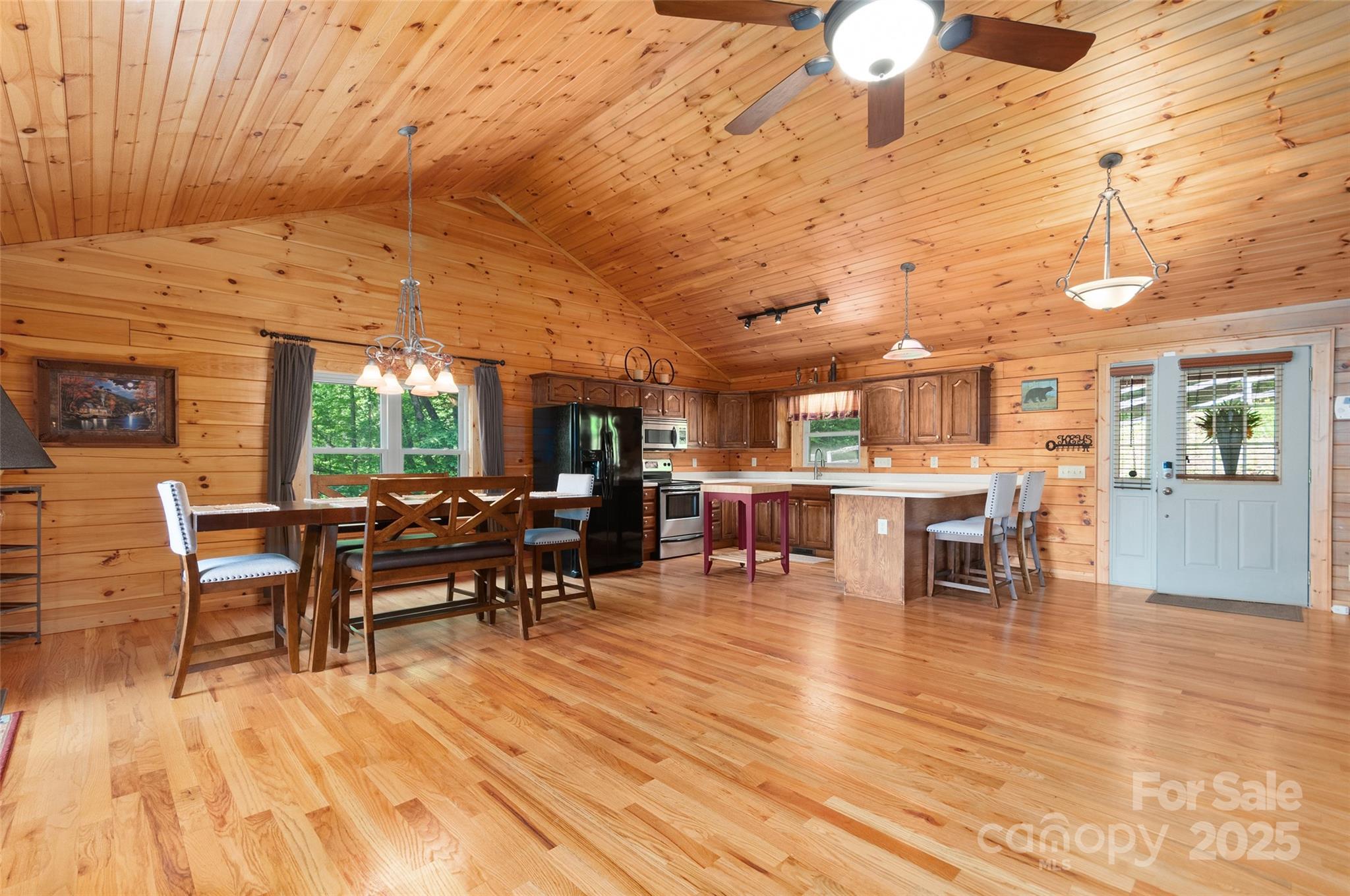 314 Prosperity Ridge Waynesville, NC 28785 - Photo 6 of 48 a outdoor space with lots of furniture and chairs