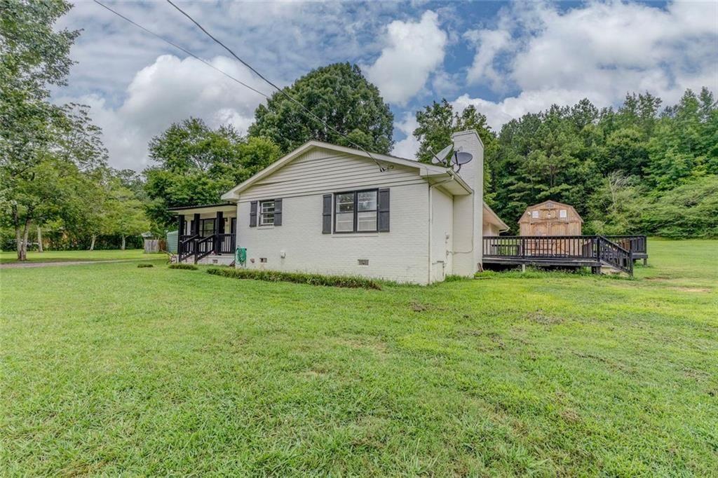 4244 Prior Station Road Cedartown, GA 30125 - Photo 13 of 51 a house view with a garden space