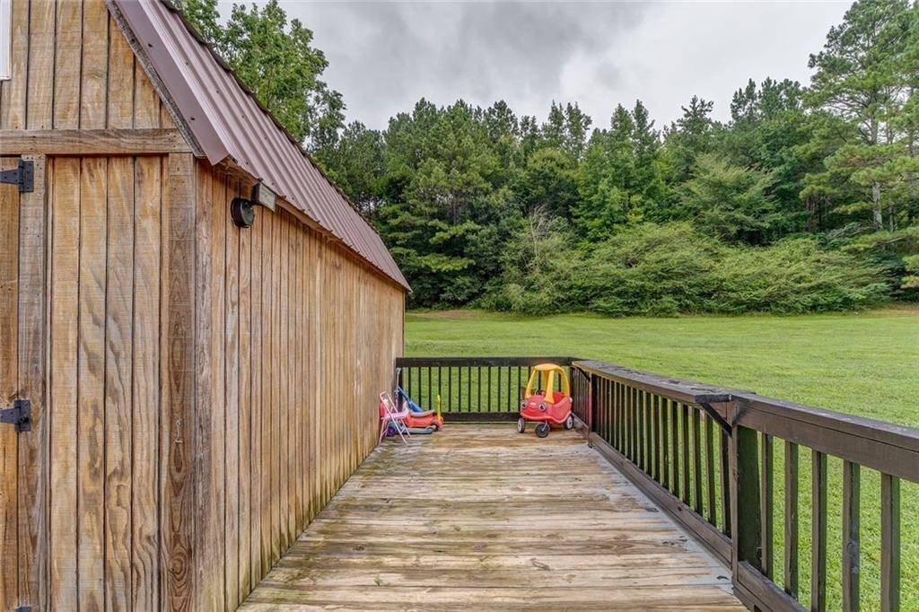 4244 Prior Station Road Cedartown, GA 30125 - Photo 19 of 51 a view of a street with wooden stairs