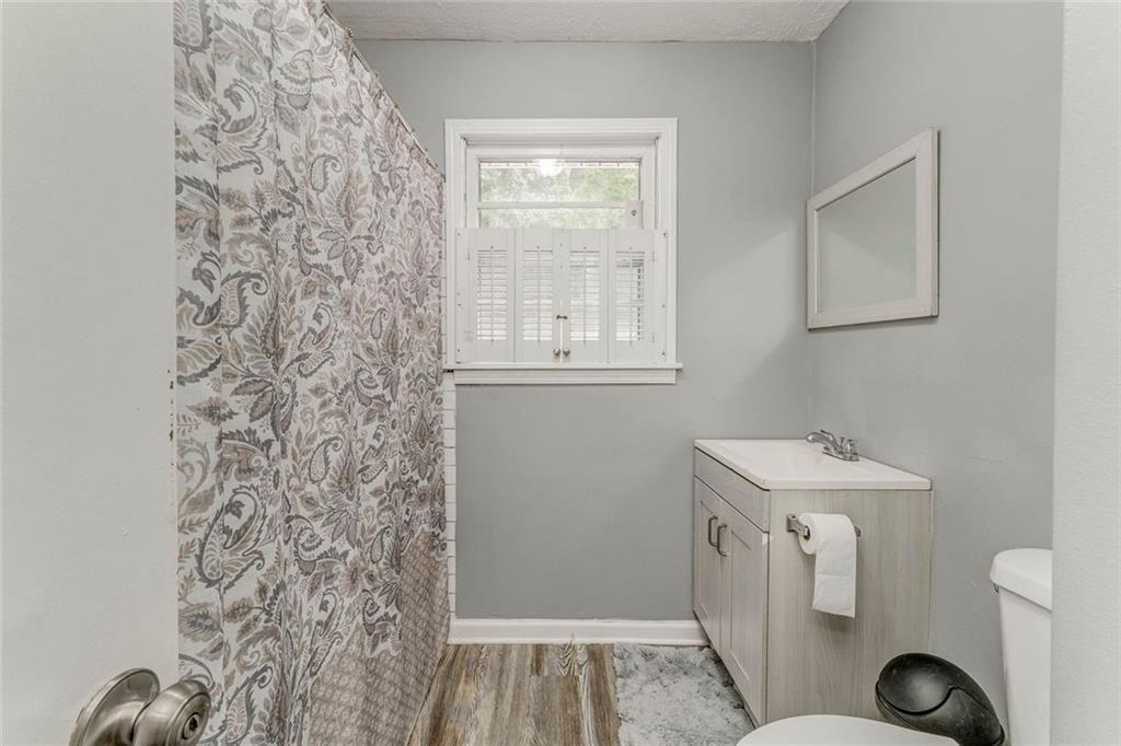 4244 Prior Station Road Cedartown, GA 30125 - Photo 29 of 51 a bathroom with a sink toilet and vanity
